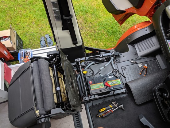 The leisure batteries live under the passenger seat. This photo was taken on an absolutely scorching day in York in 2019. The cavity barely fits 2 x 100Ah batteries.