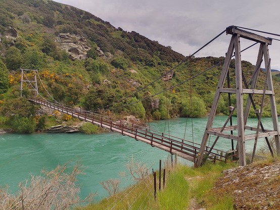 Horseshoe Bend Bridge on the Clutha. Built in the early 1900s to replace a seat-on-a-wire that school children found difficult to operate due to one end being higher than the other.