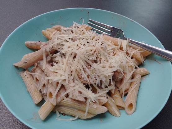 The end result with penne pasta, sour cream, tomatoes, capers, parmesan and a tiny puff ball and spring fieldcap mushroom.